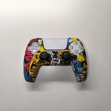 PlayStation 5 - DualSense kontroller szilikonosvédő graffity yellow